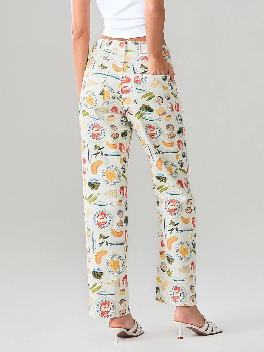 Women’s denim jeans by FJØRNA, stylish pants with classic blue denim, featuring a relaxed fit and five-pocket design.