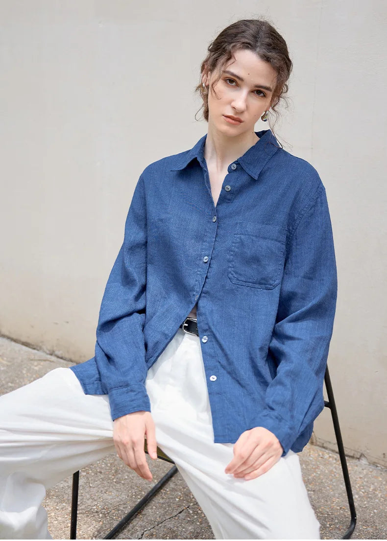 Women’s linen blend shirt by FJØRNA, stylish and lightweight tops for women, shown in a relaxed fit with natural fabric texture.