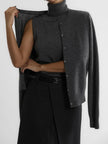 FJØRNA women's sleeveless wool vest, cozy and stylish tops for women, displayed on a neutral background.