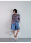 FJØRNA women's linen shirt with pleats, stylish long-sleeve top featuring a relaxed fit and natural fabric texture.