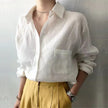 FJØRNA women's linen shirt with open collar, light and breathable top perfect for casual wear, shown in natural fabric detail