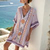 FJØRNA women's summer mini dress with V-neck, flowy fabric, sleeveless design, perfect for warm weather and casual outings.