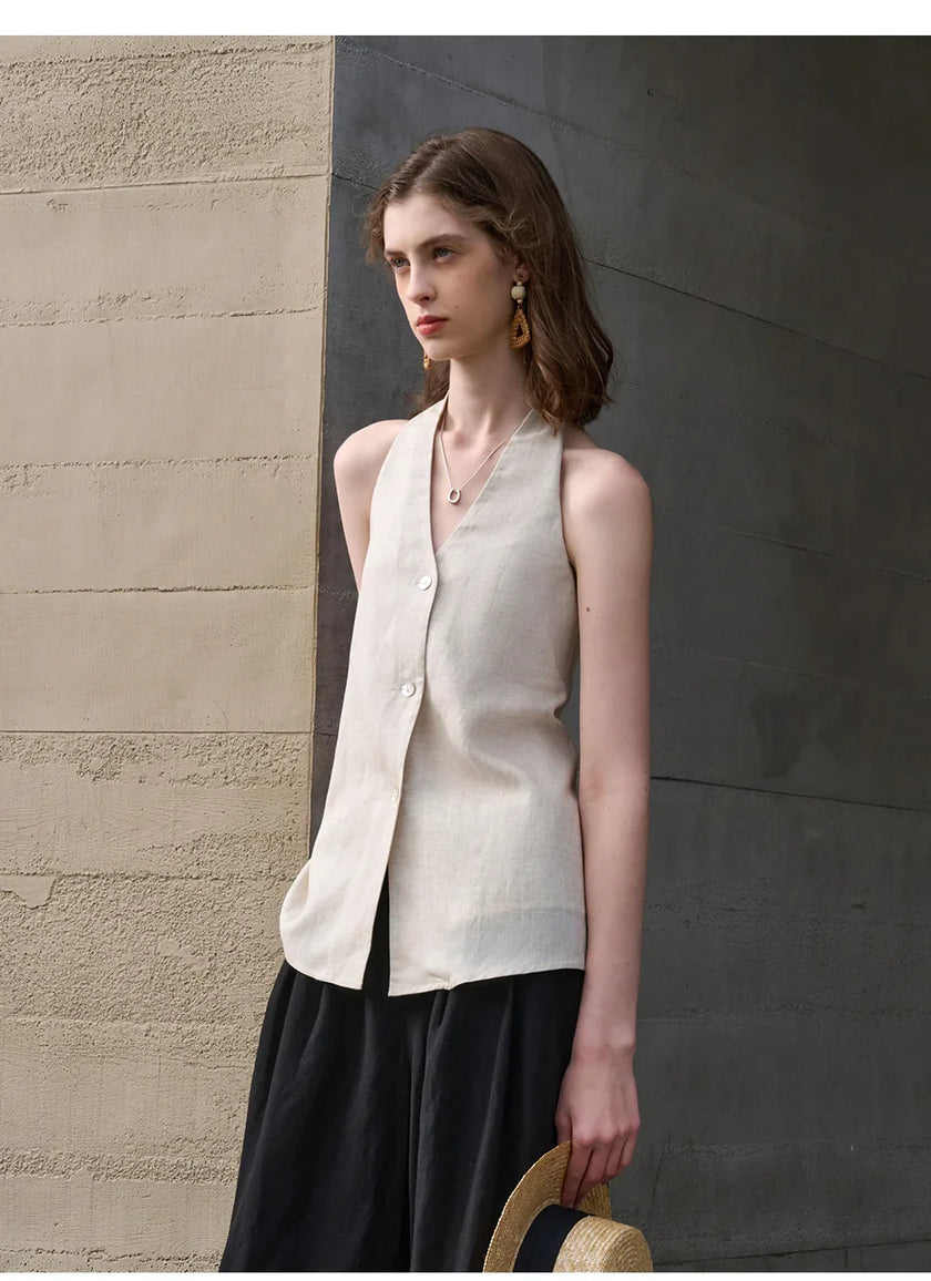 FJØRNA linen waistcoat for women with halter neck and sleeveless design, stylish top perfect for warm weather.