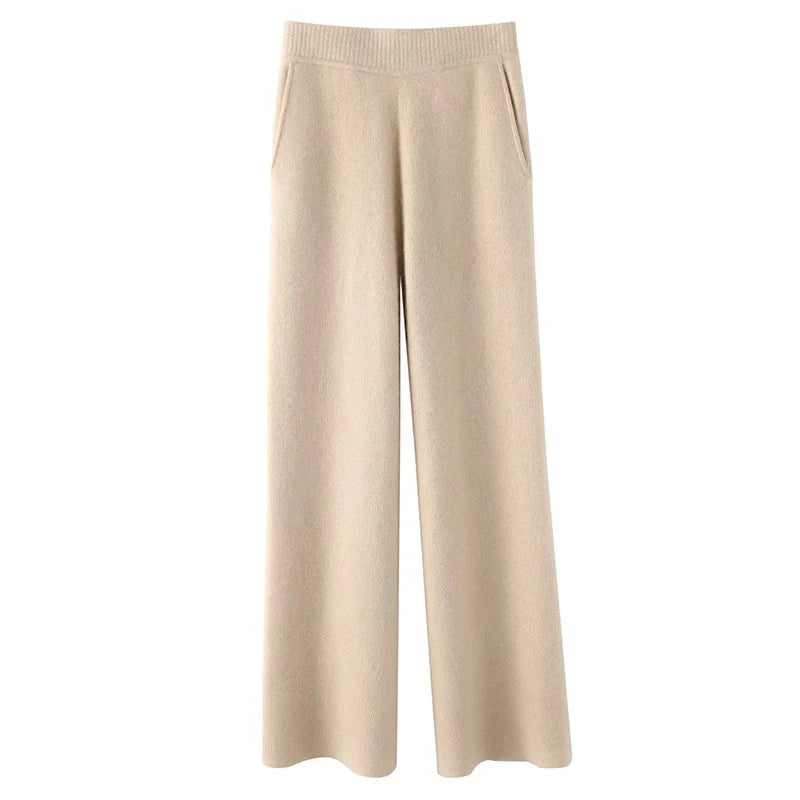 FJØRNA women's joggers pants showing relaxed fit with elastic waistband and tapered legs, made from comfortable fabric.