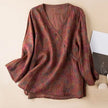 FJØRNA linen blend women's long sleeve blouse featuring a relaxed fit and natural fabric texture, ideal for casual or office wear.