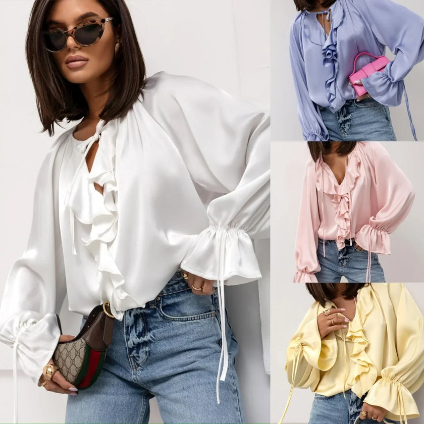FJØRNA satin women's blouse with ruffle details and long sleeves, elegant and stylish for women.