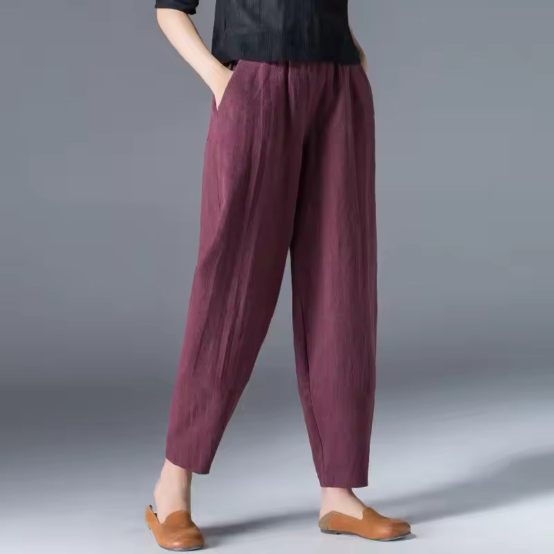 FJØRNA Desiree™ lightweight summer trousers in soft fabric, shown in a relaxed fit with a neutral color and casual style.