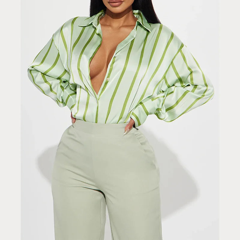 FJØRNA satin blouse for women, stylish women's top with smooth satin fabric, front button details, and elegant fit.