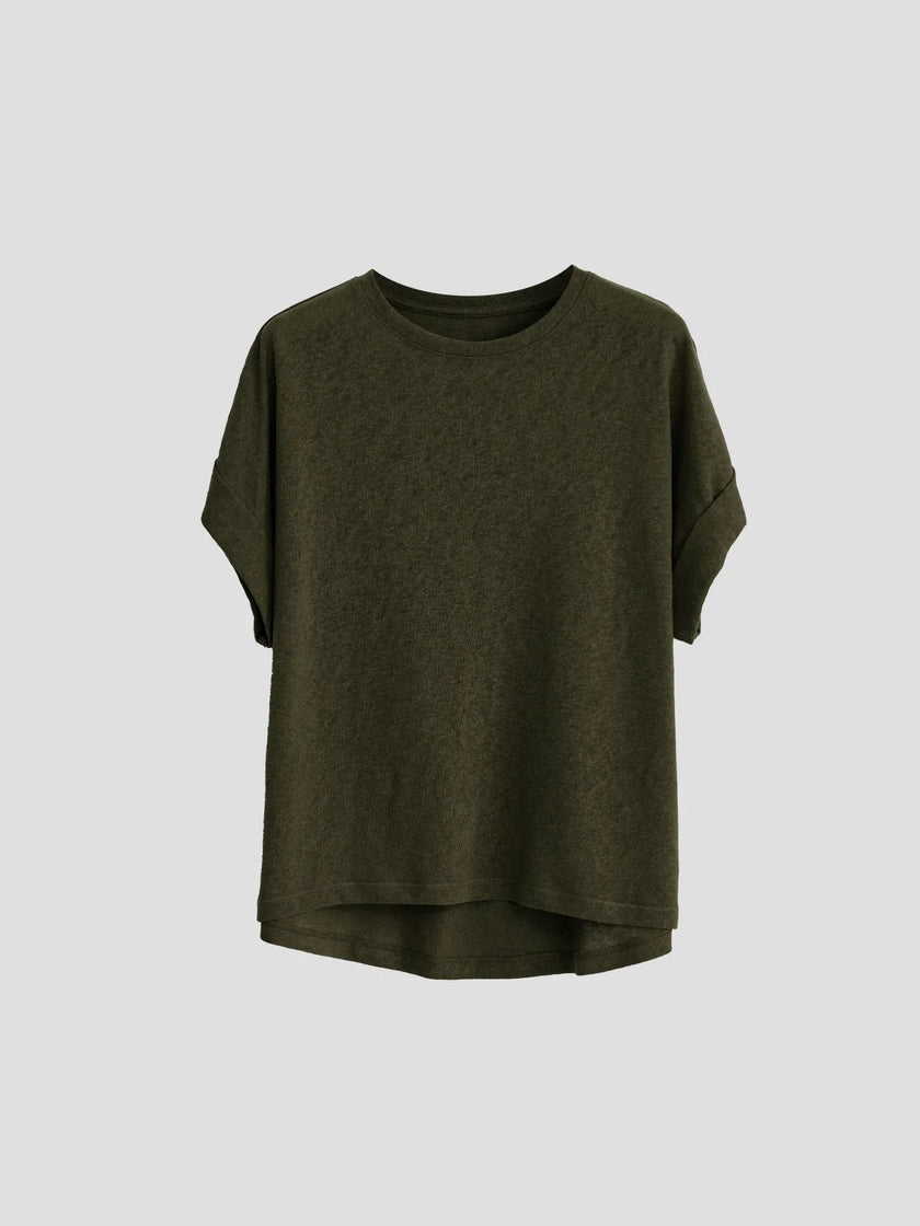 FJØRNA oversized tee with rolled cuffs, soft fabric, and relaxed fit, displayed on a neutral background.