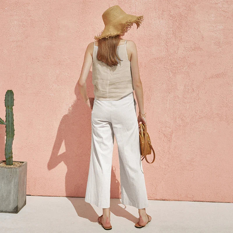 FJØRNA satin-trimmed linen camisole featuring lightweight fabric and delicate satin accents, perfect for casual or layered looks.