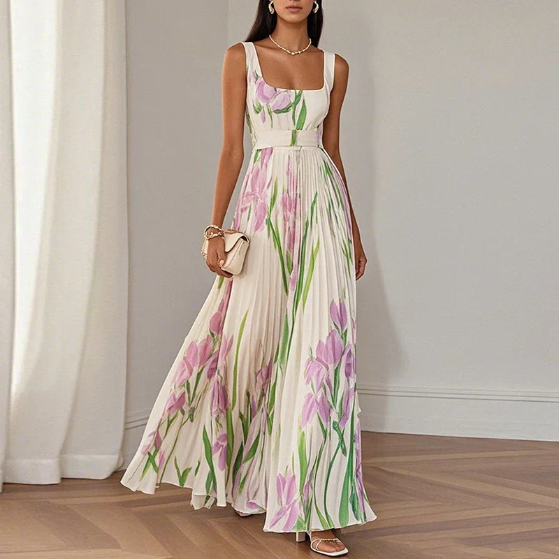 Elegant floral A-line maxi dress for women by FJØRNA, featuring a flowing silhouette and stylish design.