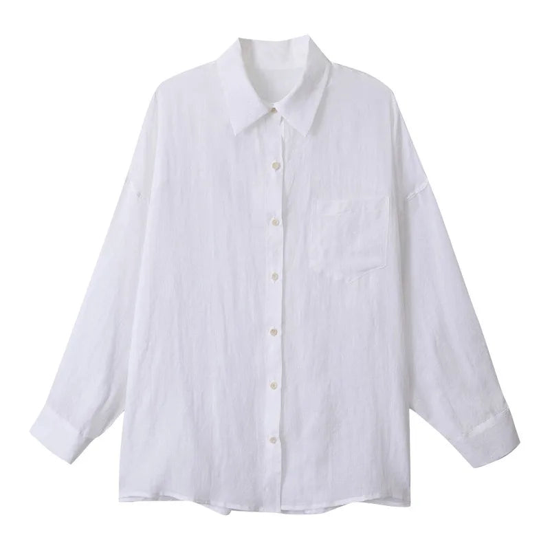 Light beige linen shirt for women by FJØRNA, featuring a relaxed fit and casual style, perfect for warm weather.