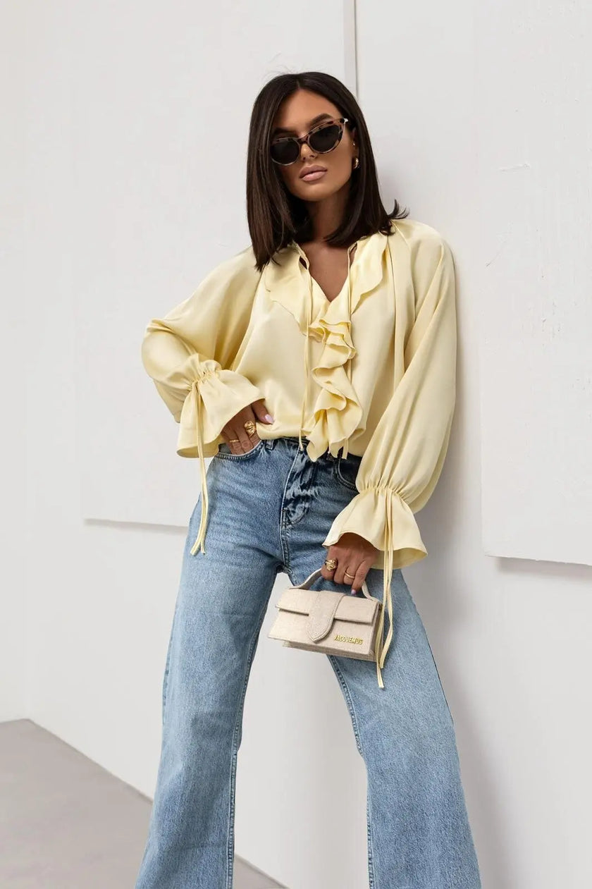 FJØRNA satin blouse for women with ruffle detail, featuring elegant design and lightweight fabric, ideal for stylish tops.