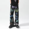 Black painted trousers by FJØRNA featuring a relaxed fit and stylish design, shown on a model.
