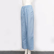 FJØRNA cotton linen wide-leg women's trousers with drawstring waist and pull-on design, showcasing relaxed, comfortable fit.