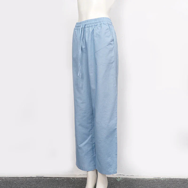 FJØRNA cotton linen wide-leg women's trousers with drawstring waist and pull-on design, showcasing relaxed, comfortable fit.