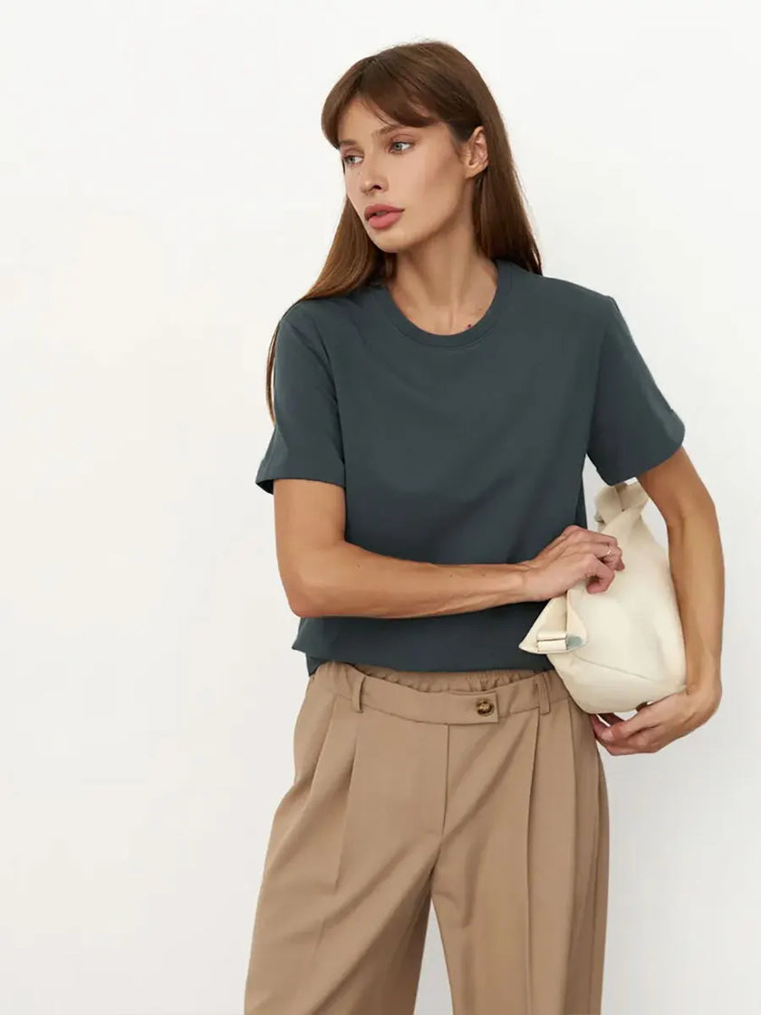 Women’s cotton T-shirt by FJØRNA featuring a comfortable fit and classic design, displayed on a neutral background.