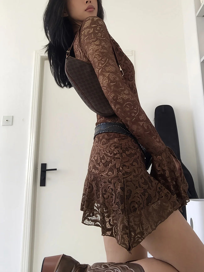 FJØRNA sheer lace mini dress for women, perfect for party and day wear, featuring delicate lace details and a fitted silhouette.