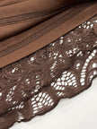 FJØRNA sheer lace mini dress featuring delicate lace fabric and a fitted silhouette, perfect for stylish evening wear.