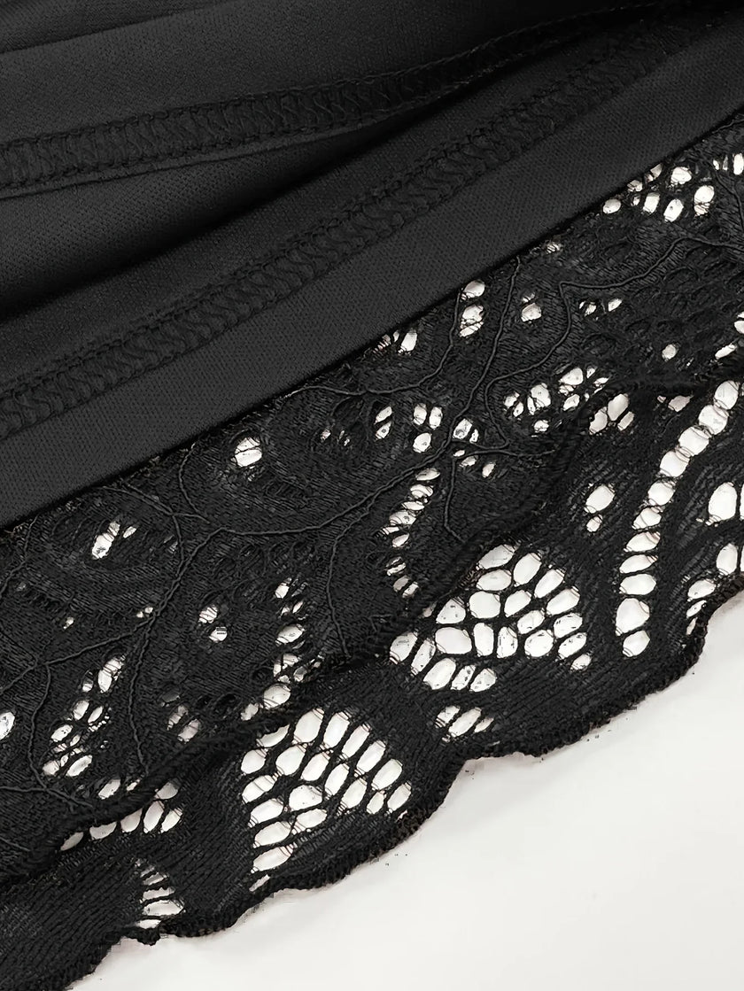 FJØRNA sheer lace mini dress featuring intricate lace details and a fitted silhouette, perfect for stylish evening wear.