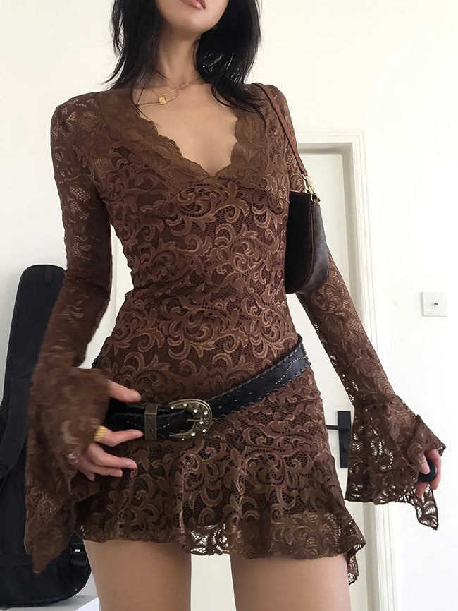 Sheer lace mini dress for women by FJØRNA, perfect for party or day wear, featuring intricate lace details and a stylish fit.