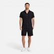 Men's lightweight summer shirt and shorts set by FJØRNA, featuring casual, breathable fabric perfect for warm weather.