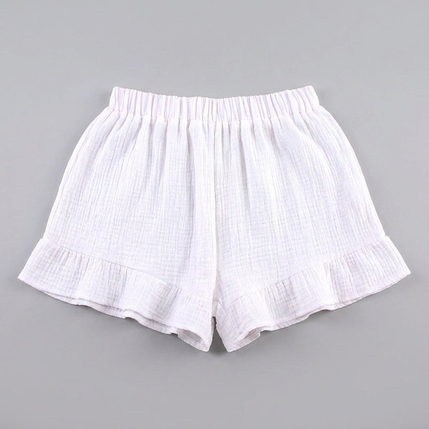 FJØRNA airy white kimono two-piece set with flowing ruffle shorts, lightweight and stylish summer outfit for women.