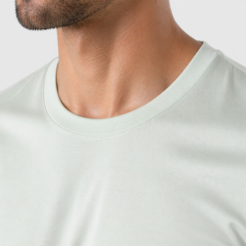 Men's FJØRNA Ice Silk T-Shirt with lightweight, cooling silk touch fabric, designed for comfortable, breathable wear.