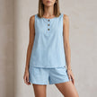 Sky blue FJØRNA two-piece women's co-ord set with button-front top and matching pants, stylish and comfortable for casual wear.