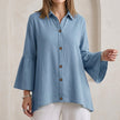 Sky blue women's summer swimsuit by FJØRNA featuring tiered, ruched design, perfect for warm weather and beach outings.