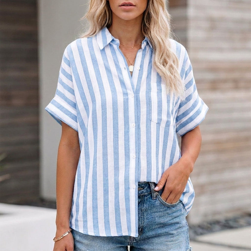 Sky blue striped linen summer blouse for women by FJØRNA, featuring a button-front casual top with short sleeves.