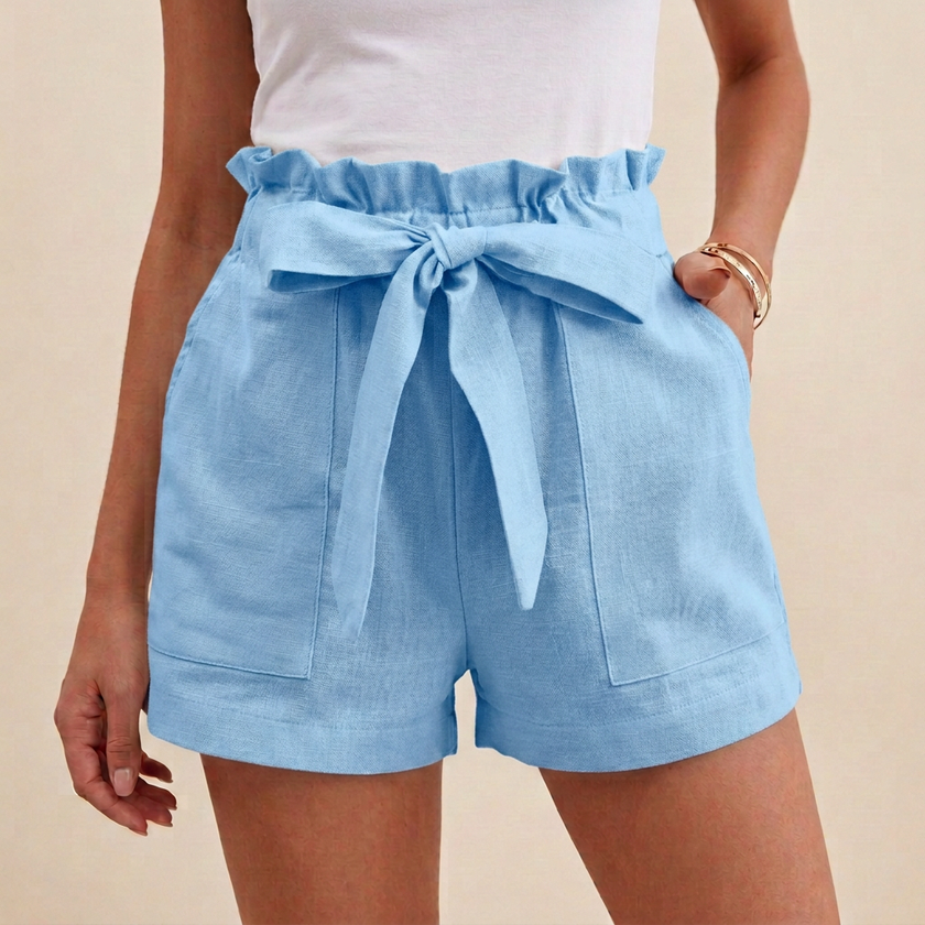 Sky blue women's linen summer shorts with high waist and pockets by FJØRNA, casual and comfortable for warm weather.