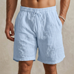 Sky blue men's casual drawstring shorts with side pockets from FJØRNA, featuring a relaxed fit and comfortable design.