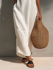 FJØRNA sleeveless maxi dress for women with flowy fabric and elegant design, perfect for casual or summer wear.