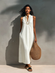 FJØRNA sleeveless maxi dress for women featuring a flowing fabric and elegant design, perfect for summer or casual occasions.