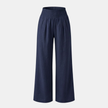 FJØRNA women's linen blend wide-leg trousers with smocked waist and relaxed fit, featuring an elastic waistband and flowy design.