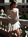 FJØRNA soft girl ruffled mini dress with delicate frills and pastel color, perfect for a stylish, feminine look.