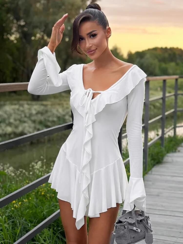 FJØRNA soft girl ruffled mini dress featuring a feminine silhouette with layered ruffles and a flowy fabric.