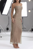 White FJØRNA sparkle sequined fit maxi dress, showcasing elegant design with shimmering sequins and fitted silhouette.