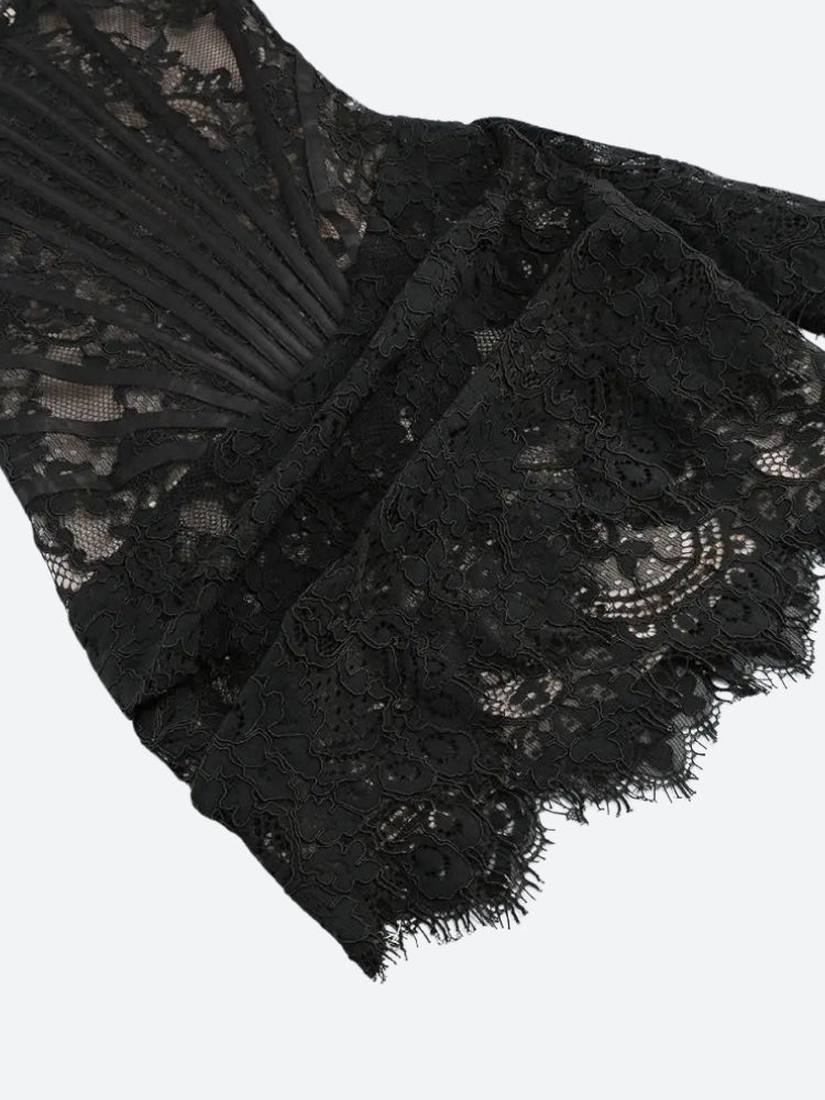 FJØRNA strapless lace mini dress for women, featuring a stylish design suitable for party and day wear, shown on a model.