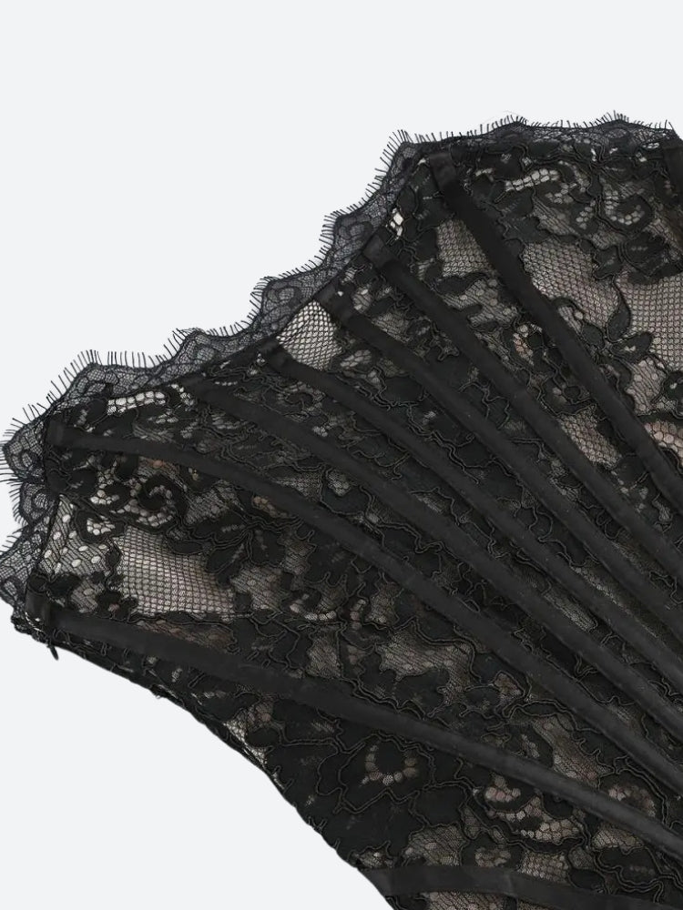 FJØRNA strapless lace mini dress featuring a fitted bodice and flared skirt, perfect for party and daytime occasions.