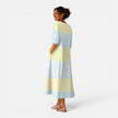 Women's breathable striped midi dress by FJØRNA, lightweight summer fit, flowing design ideal for warm weather.