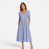 FJØRNA women's striped midi dress with button details and pockets, stylish and comfortable for casual wear.