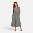 Women's FJØRNA striped button detail midi dress with pockets, featuring a stylish design and casual fit.