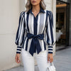 FJØRNA women's summer striped blouse with puff sleeves, lightweight top featuring vertical stripes and a relaxed fit.
