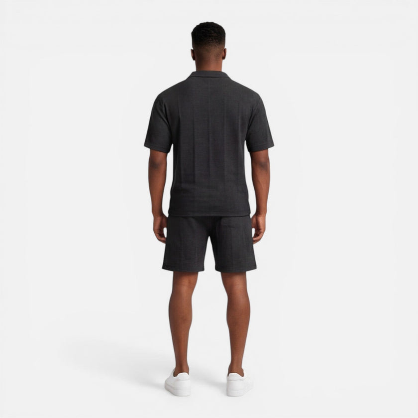 Men's structured knit polo shorts set by FJØRNA, breathable summer two-piece outfit for men, featuring a classic polo and matching shorts.