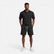 Men's breathable knit polo shorts set by FJØRNA, featuring a structured design for summer fashion, includes a polo shirt and shorts.