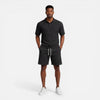 Men's breathable knit polo shorts set by FJØRNA, featuring a structured design for summer fashion, includes a polo shirt and shorts.