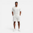 Men's structured knit polo shorts set by FJØRNA, breathable summer two-piece ensemble featuring stylish design and comfortable fit.