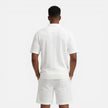 Men's breathable summer knit polo shorts set by FJØRNA, featuring a structured design and casual style for warm weather.